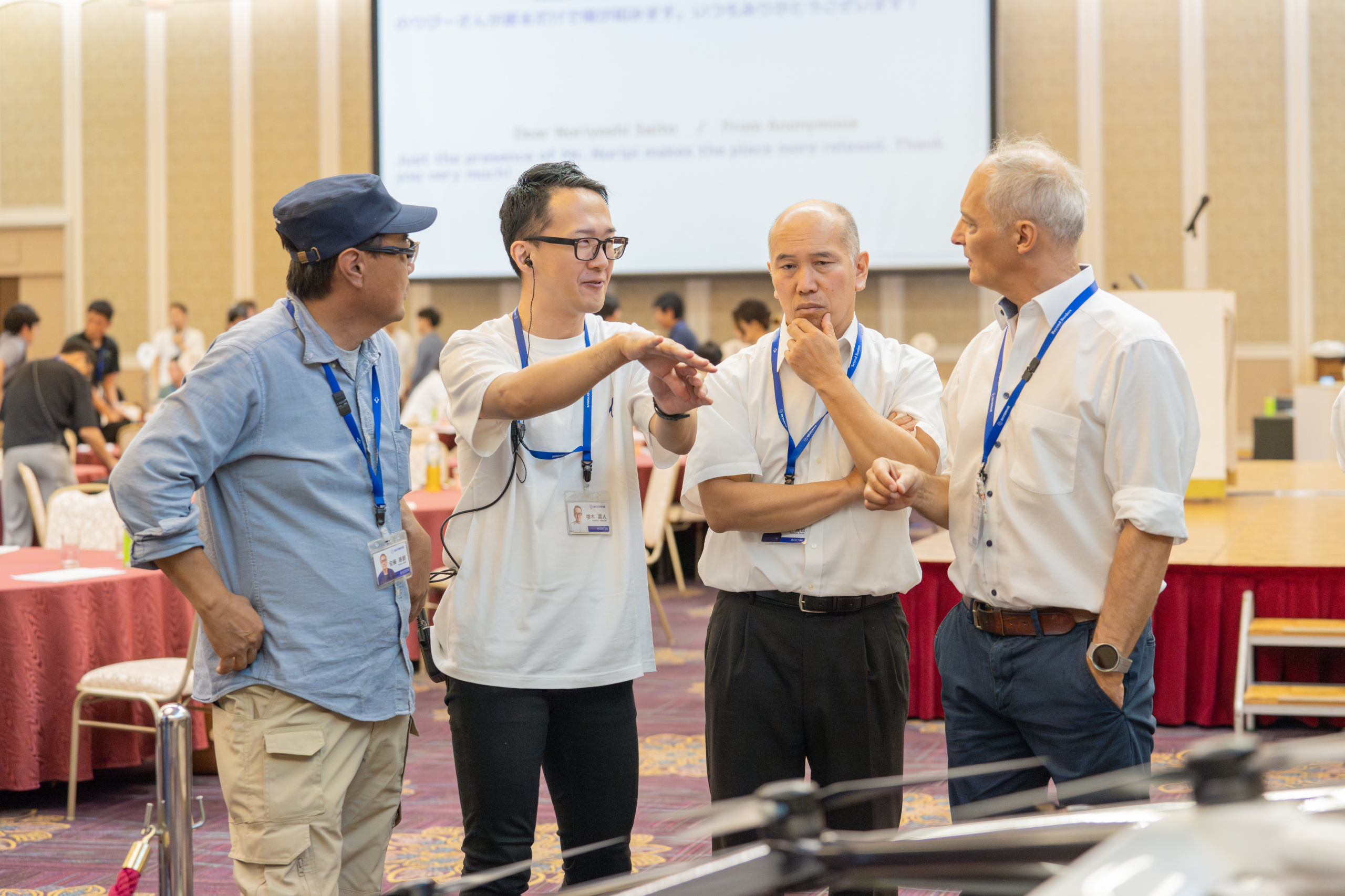 Arnaud Coville speaking with members of the SkyDrive development team