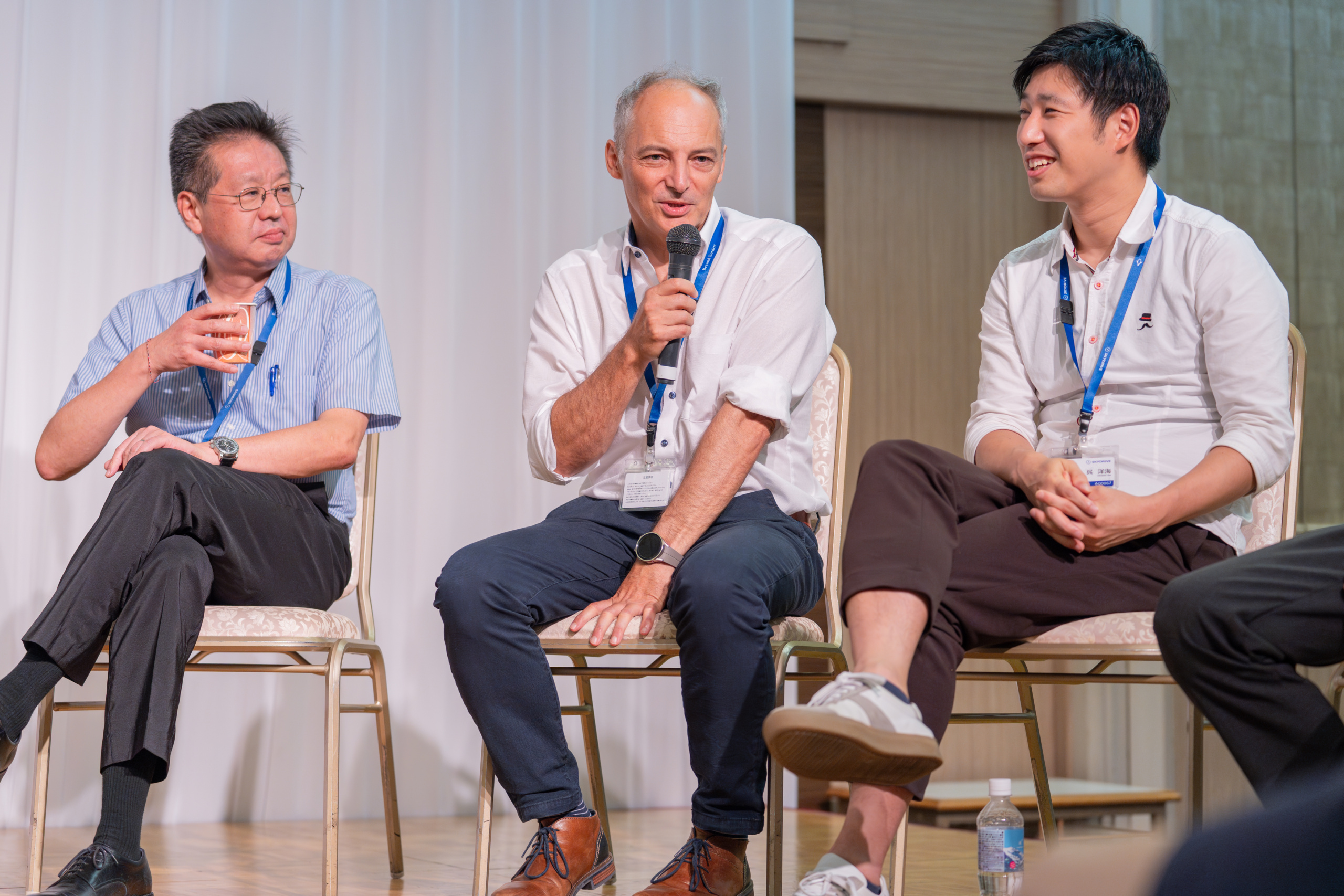 Arnaud Coville speaking at a SkyDrive event